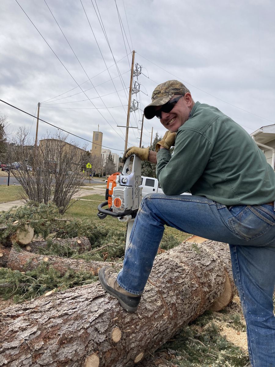 413 Services crew member on the job in Rapid City